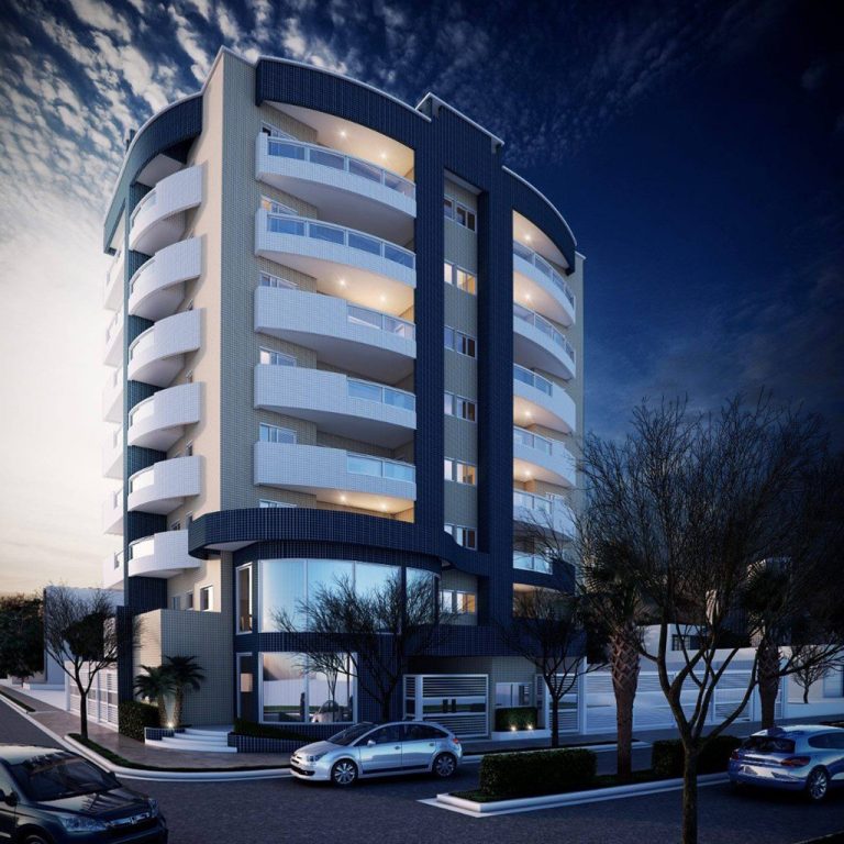 مبنى ليلي باللون الأزرق الغامق واللون الأبيض، مع سماء مليئة بالغيوم. | A nighttime building in dark blue and white, with a sky filled with clouds.