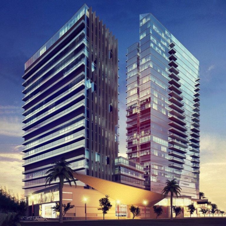 مبنيان ملونان بألوان دافئة، أحدهما كبير والآخر صغير، يظهران بشكل منفصل عن بعضهما. | Two colorful buildings, one large and the other small, shown separately from each other.